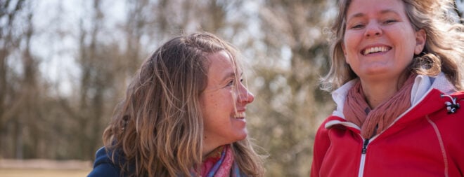 2 women laughing